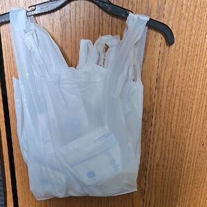 Free White Plastic Shopping Bag With Any Purchase. Garage sale, Garbage liner